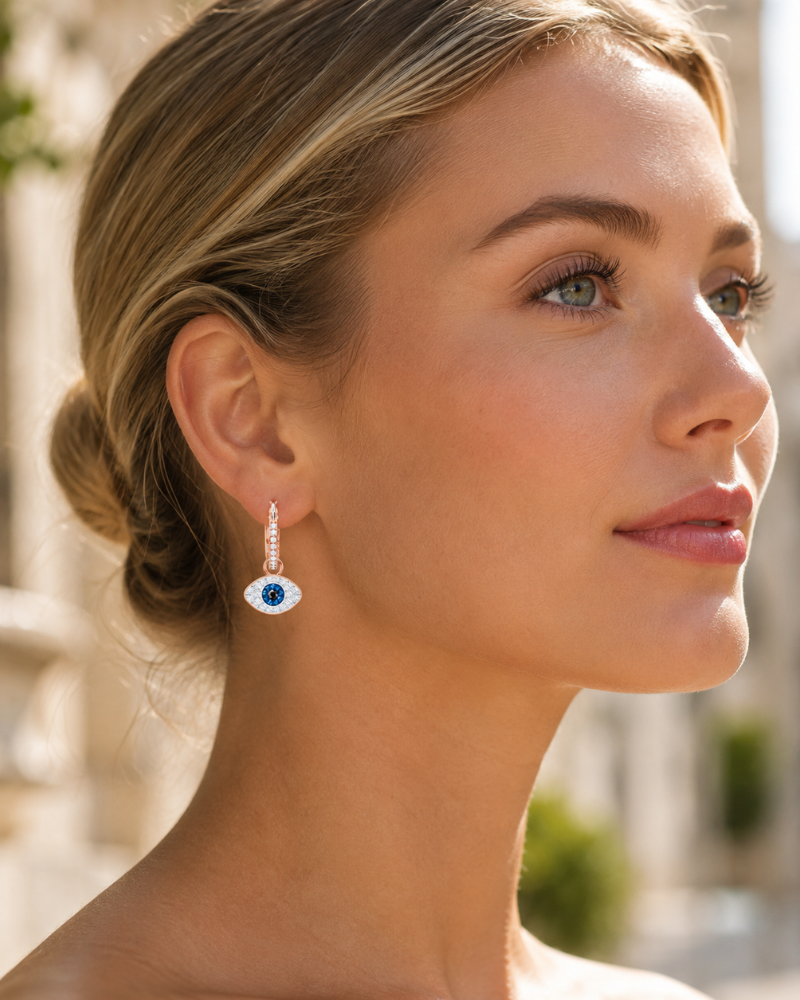 Pendientes Penelope para mujer – Aros chapados en oro rosa colgante ojo con cristales incrustados