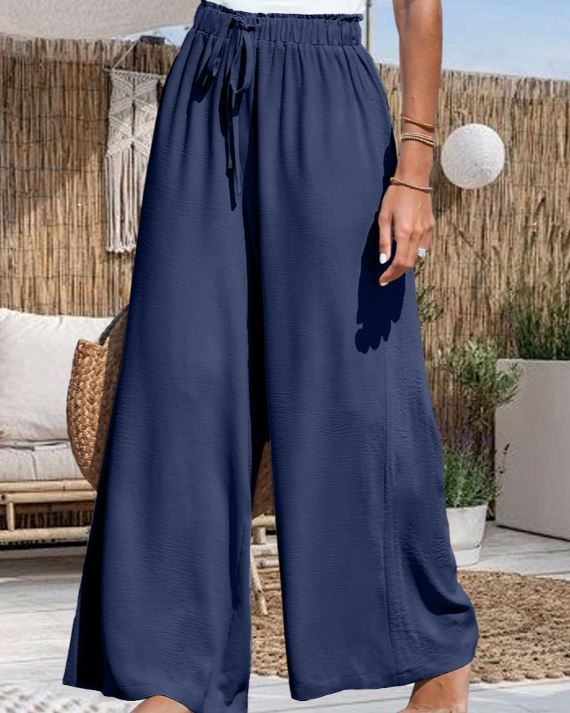 Pantaloni Presley da donna – Pantaloni larghi vita alta con coulisse fluidi per spiaggia e vacanze